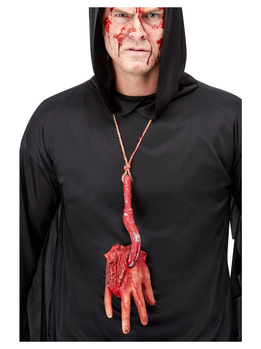 A necklace with a severed hand, on a hook